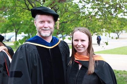 Dr. Hale and a student at commencement