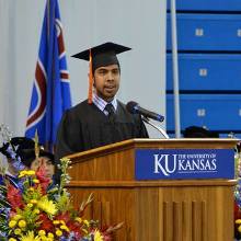 A student speaking at commencement